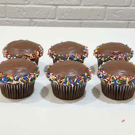 6 chocolate cupcake with chocolate hard icing